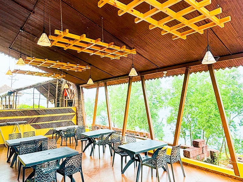 Gazebo area at Andur Lakeview Resort with seating and garden view