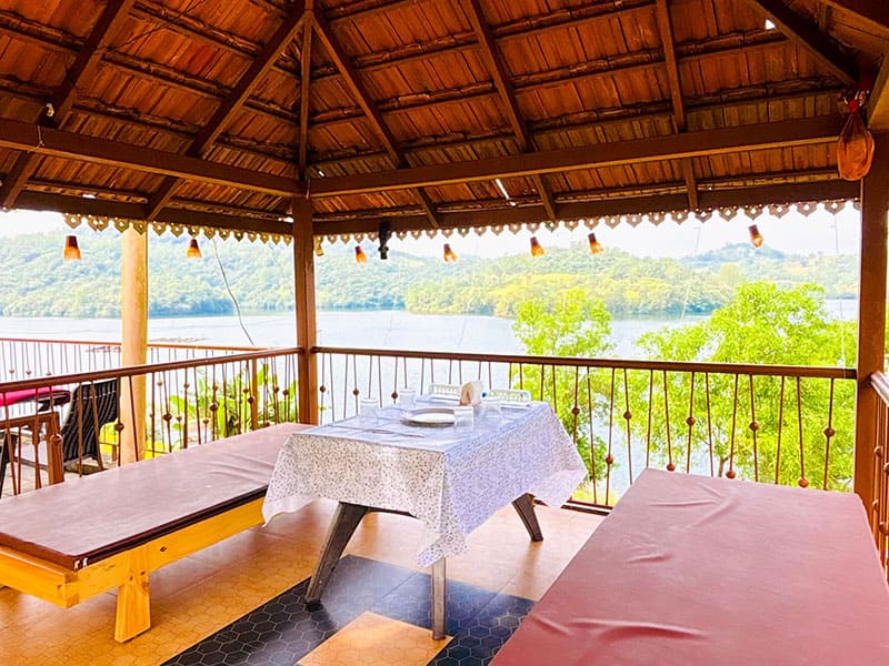 Gazebo area at Andur Lakeview Resort with seating and garden view