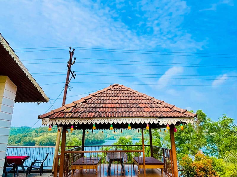 Gazebo area at Andur Lakeview Resort with seating and garden view